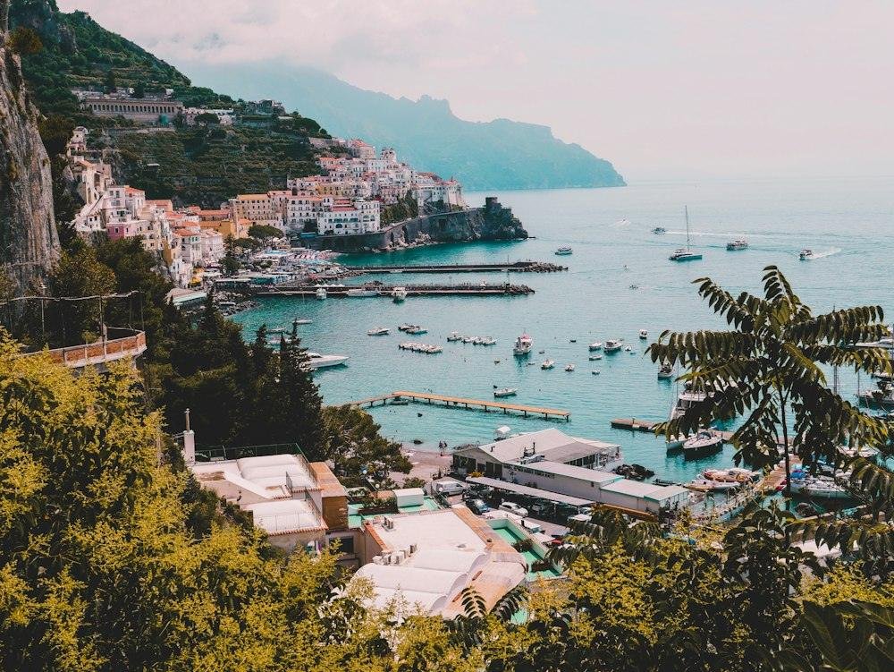 Pastel houses stacked above the sea on the Amalfi Coast