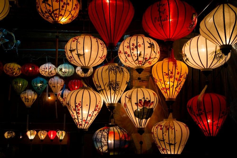 Silk lanterns glowing at night in Hoi An