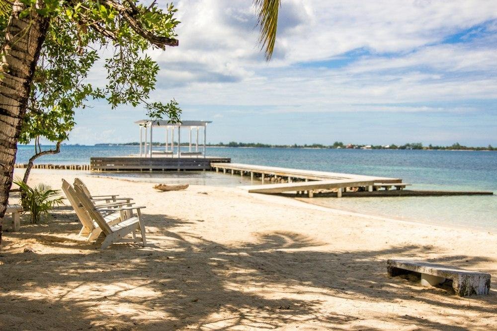 Wooden dock and beach chairs on Utila