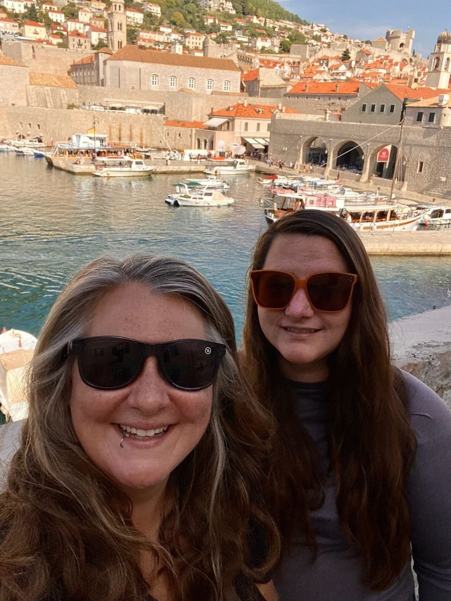 Mariya and Sam taking a selfie above the harbor in Dubrovnik